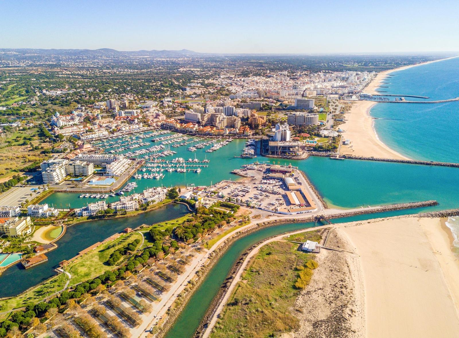 Real aerial photograph of Vilamoura marina and the coastline